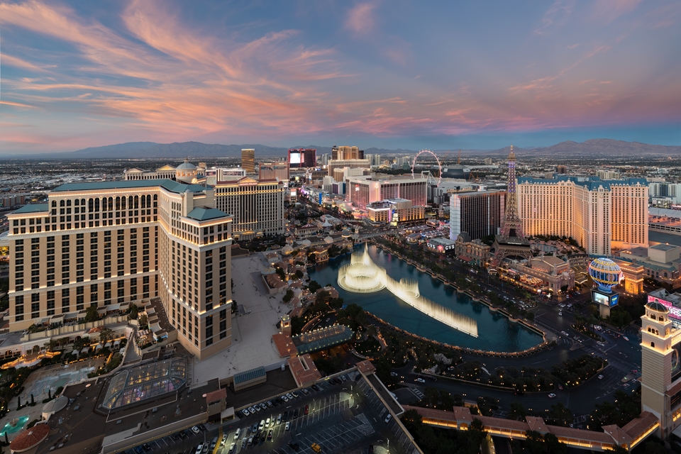 Sunset in Las Vegas Strip overlooking Bellagio water fountain